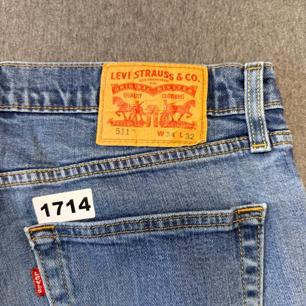Levis 511 Slim Fit Jeans Mens 34x32 Light Wash Blue Denim Distressed 00511-1322